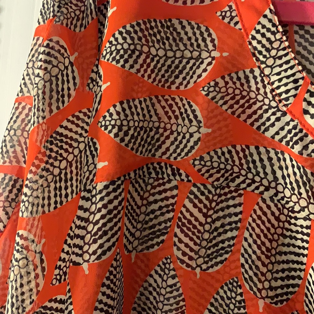 Orange black and white leaf print flowy top